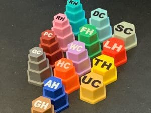 Custom Tooled Game Pieces in Plastic and Metal / Custom Tooling Pieces